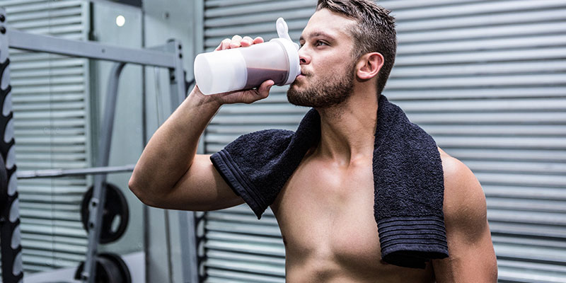 Man drinking protein